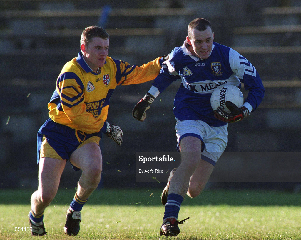 14 January 2001; Paul Dunne of Laois is tackled by David Hannify of Longford during the O'Byrne Cup First Round match between Longford and Laois at Pearse Park in Longford. Photo by Aoife Rice/Sportsfile