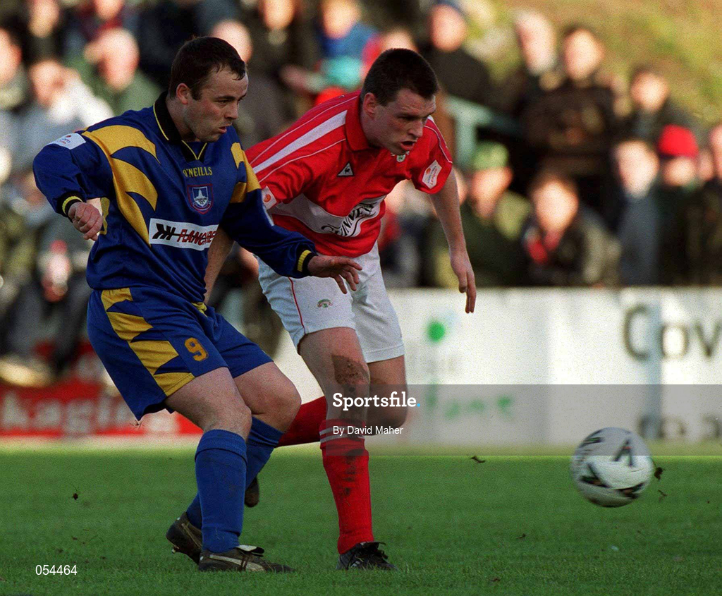14 January 2001; Nial Byrne of Longford Town in action against Stephen Napier of Cork City during the Eircom League Cup Second Round Replay match between Cork City and Longford Town at Turners Cross in Cork. Photo by David Maher/Sportsfile