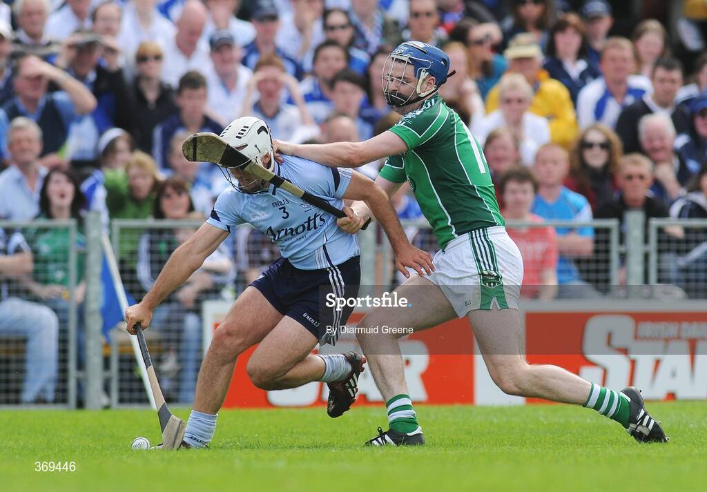 26 July 2009; Tomas Brady, Dublin, in action against Paudie McNamara, Limerick. GAA All-Ireland Senior Hurling Championship Quarter-Final, Dublin v Limerick, Semple Stadium, Thurles, Co. Tipperary. Picture credit: Diarmuid Greene / SPORTSFILE