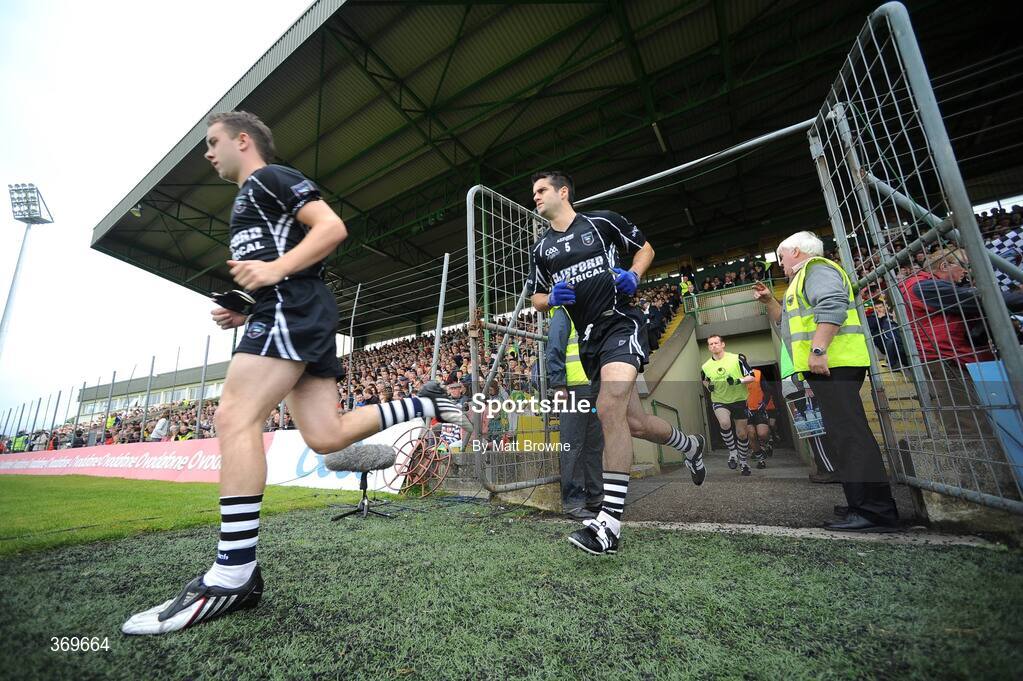 18 July 2009; Sligo players Michael McNamara, 5, and  Stephen Coen make their way onto the pitch for the start of the game. GAA All-Ireland Senior Football Championship Qualifier, Round 3, Kerry v Sligo, Austin Stack Park, Tralee, Co. Kerry. Picture credit: Matt Browne / SPORTSFILE