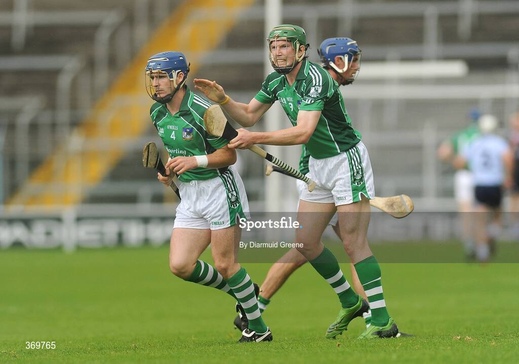 26 July 2009; Limerick's Mark O'Riordan gets a pat on the back from team-mate Seamus Hickey. GAA All-Ireland Senior Hurling Championship Quarter-Final, Dublin v Limerick, Semple Stadium, Thurles, Co. Tipperary. Picture credit: Diarmuid Greene / SPORTSFILE