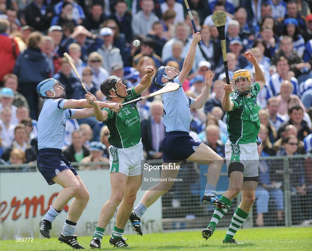 26 July 2009; Joe Boland, left, and Maurice O'Brien, Dublin, in action against Ollie Moran, left, and David Breen, Limerick. GAA All-Ireland Senior Hurling Championship Quarter-Final, Dublin v Limerick, Semple Stadium, Thurles, Co. Tipperary. Picture credit: Diarmuid Greene / SPORTSFILE
