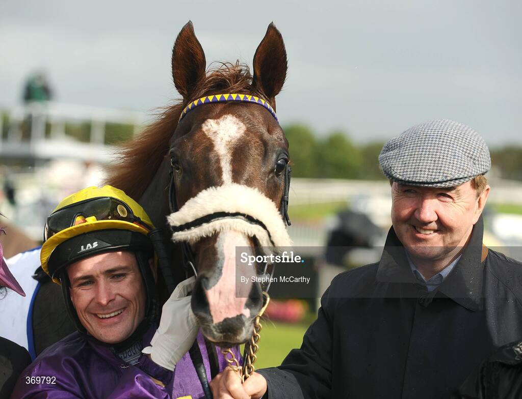 27 July 2009; Jockey Pat Smullen and trainer Dermot Weld after they won the radissonhotelgalway.com European Breeders Fund Maiden with Stunning View. Galway Racing Festival, Ballybrit, Galway. Picture credit: Stephen McCarthy / SPORTSFILE