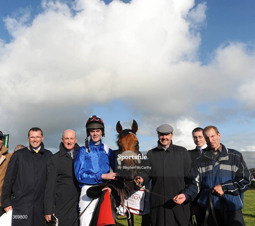 27 July 2009; Jockey Robbie McNamara, trainer Dermot Weld, and winning connection after winning the Carlton.ie/Galwaycity Handicap with Ghimaar. Galway Racing Festival, Ballybrit, Galway. Picture credit: Stephen McCarthy / SPORTSFILE