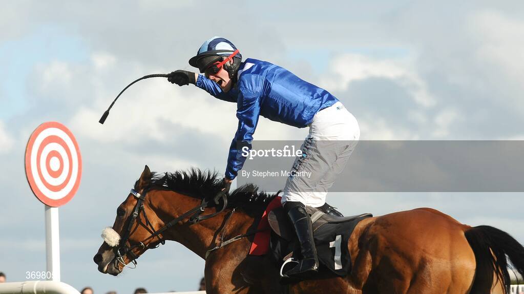 27 July 2009; Jockey Robbie McNamara celebrates on his way to winning the Carlton.ie/Galwaycity Handicap on Ghimaar. Galway Racing Festival, Ballybrit, Galway. Picture credit: Stephen McCarthy / SPORTSFILE