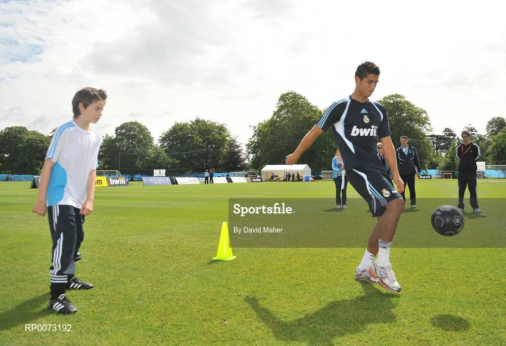 19 July 2009; Real Madrid's Cristiano Ronaldo practices his skills as Andrew Howell watches on during a special training session run by adidas and Lifestyle Sports. Real Madrid pre-season squad training, Carton House, Maynooth, Co. Kildare. Picture credit: David Maher / SPORTSFILE