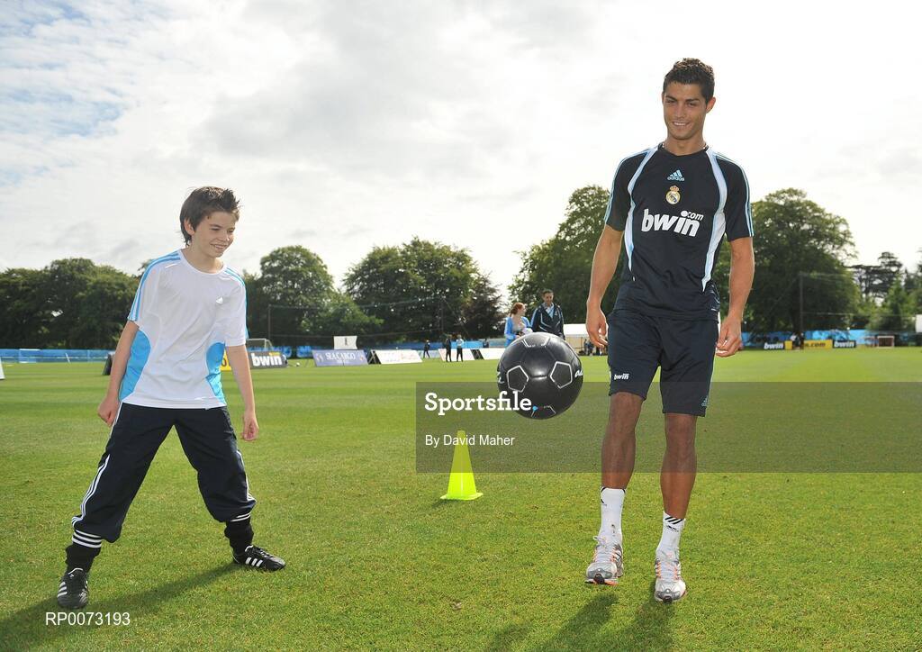 19 July 2009; Real Madrid's Cristiano Ronaldo practices his skills as Andrew Howell watches on during a special training session run by adidas and Lifestyle Sports. Real Madrid pre-season squad training, Carton House, Maynooth, Co. Kildare. Picture credit: David Maher / SPORTSFILE
