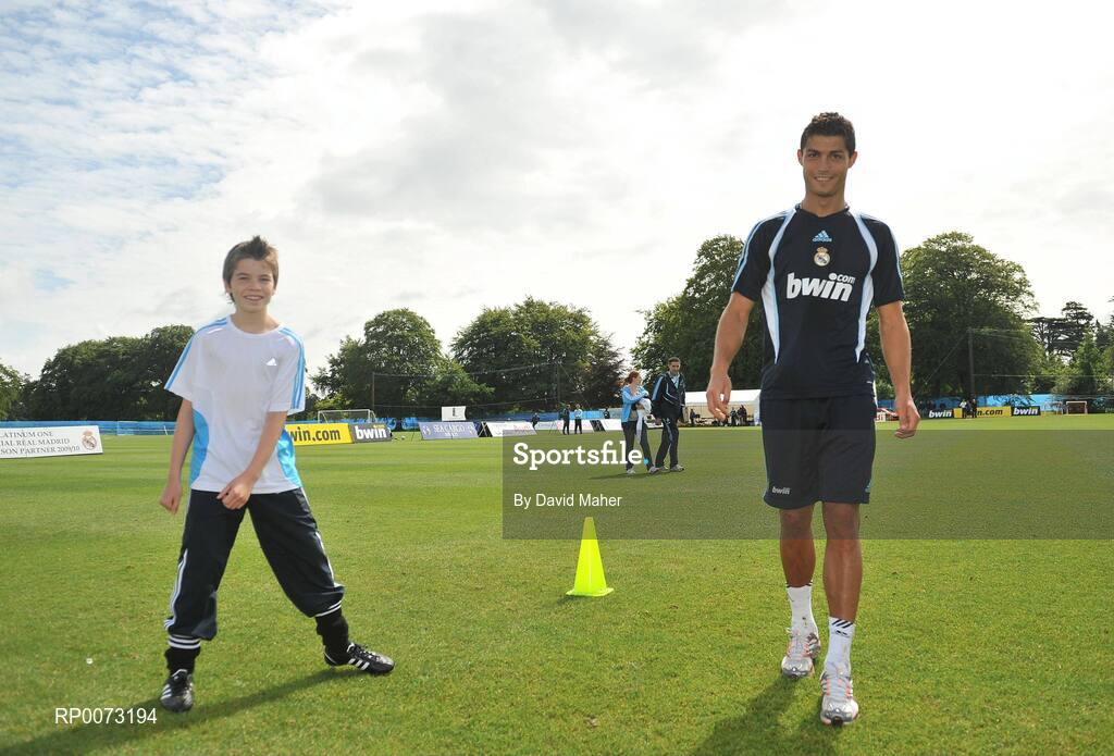 19 July 2009; Real Madrid's Cristiano Ronaldo practices his skills as Andrew Howell watches on during a special training session run by adidas and Lifestyle Sports. Real Madrid pre-season squad training, Carton House, Maynooth, Co. Kildare. Picture credit: David Maher / SPORTSFILE