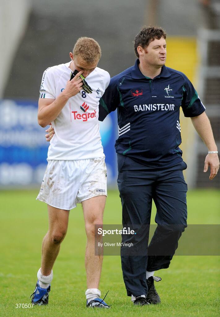 1 August 2009; Kildare manager Bryan Murphy commiserates with Tomas Moolick, Kildare, after the game. ESB GAA Football All-Ireland Minor Championship Quarter-Final, Armagh v Kildare, Kingspan Breffni Park, Cavan. Picture credit: Oliver McVeigh / SPORTSFILE
