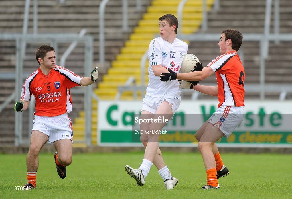 1 August 2009; Padraig Fogarty, Kildare, in action against Kealan Downey and Kevin Nugent, Armagh. ESB GAA Football All-Ireland Minor Championship Quarter-Final, Armagh v Kildare, Kingspan Breffni Park, Cavan. Picture credit: Oliver McVeigh / SPORTSFILE