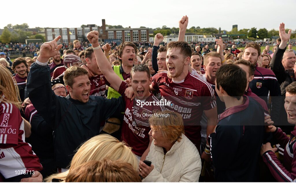 27 September 2015;  Ruairi Og Cushendall players celebrating with fans after the game. Antrim Senior Championship Hurling Final, Ruairi Og Cushendall v Ballycastle McQuillan, Dunloy GAA Club, Dunloy, Co. Antrim. Picture credit: Oliver McVeigh / SPORTSFILE