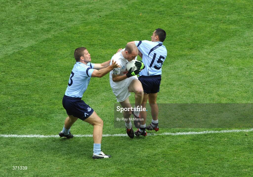 12 July 2009; Hugh McGrillen, Kildare, in action against Conal Keaney, left, and Jason Sherlock, Dublin. GAA Football Leinster Senior Championship Final, Dublin v Kildare, Croke Park, Dublin. Picture credit: Ray McManus / SPORTSFILE