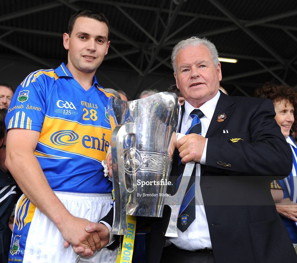 12 July 2009; Tipperary capain Willie O'Brien is presented with the cup by Jimmy O'Gorman, Chairman of the Munster Council. GAA Hurling Munster Senior Championship Final, Tipperary v Waterford, Semple Stadium, Thurles, Co. Tipperary. Picture credit: Brendan Moran / SPORTSFILE