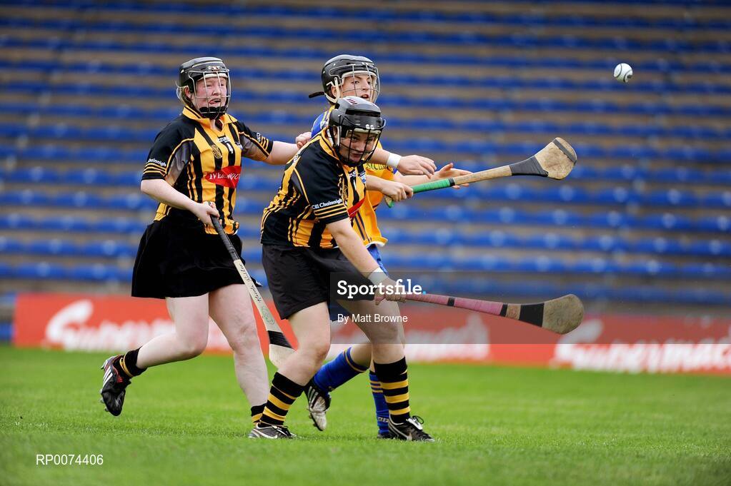 8 August 2009; Shonagh Enright, Clare, scores a goal against Kilkenny despite the attention of Nicola Butler, 4, and goalkeeper Emma Staunton. All-Ireland Camogie Minor A Championship Final, Kilkenny v Clare, Semple Stadium, Thurles, Co. Tipperary. Picture credit: Matt Browne / SPORTSFILE