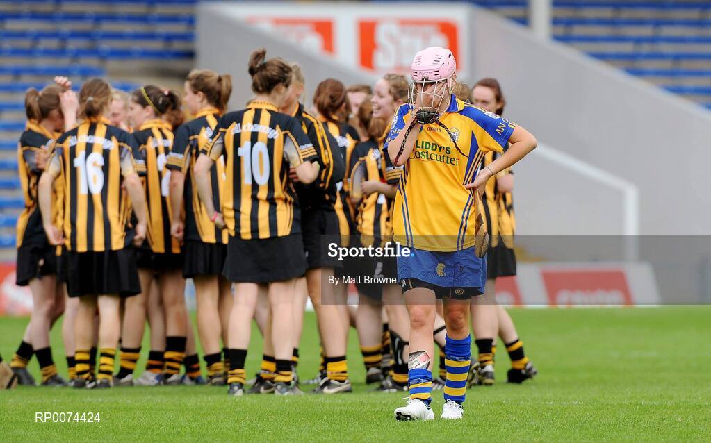 8 August 2009; Clare's Niamh Corry puts her hand to her face as Kilkenny players celebrate in the backround. All-Ireland Camogie Minor A Championship Final, Kilkenny v Clare, Semple Stadium, Thurles, Co. Tipperary. Picture credit: Matt Browne / SPORTSFILE