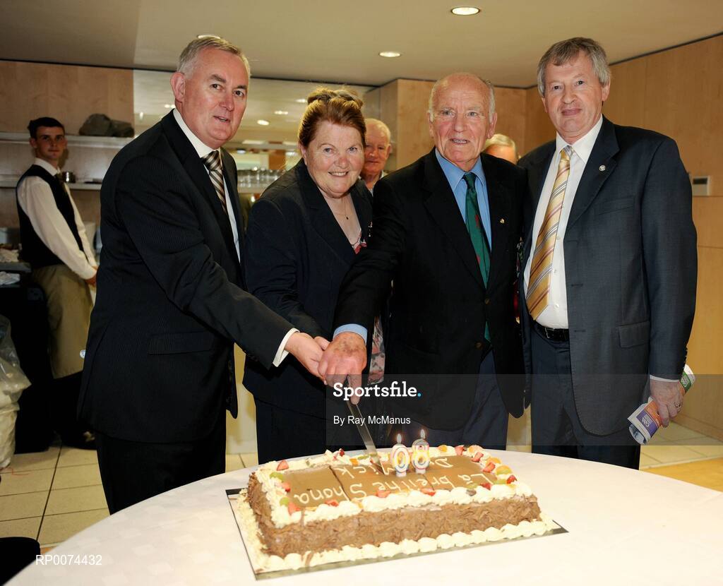 9 August 2009; Former GAA President and Mayo footballer Dr. Mick Loftus cuts a cake presented to him on the occasion of his 80th birthday with his wife Eidie, Uachtarán Chumann Lúthchleas Gael Criostóir Ó Cuana, left, and Ard Stiúrthoir Paraic Duffy, right. Dr. Mick Loftus Celebrates 80th Birthday, Croke Park, Dublin. Picture credit: Ray McManus / SPORTSFILE