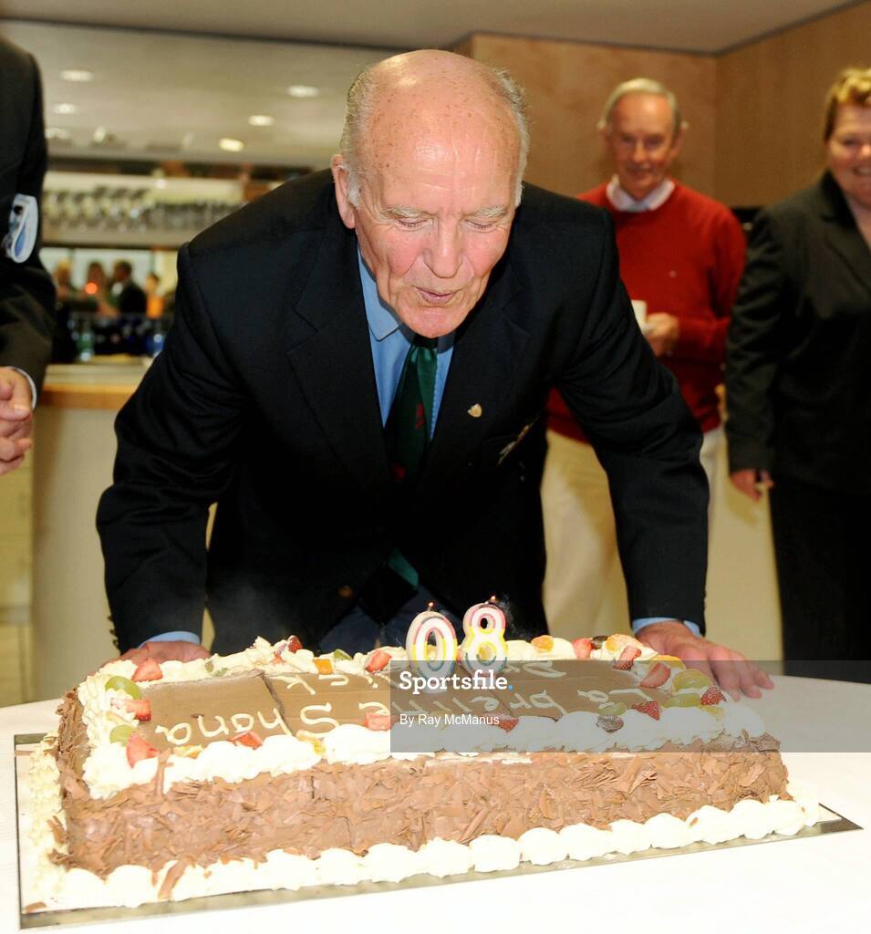 9 August 2009; Former GAA President and Mayo footballer Dr. Mick Loftus blows out the candles in a cake presented to him on the occasion of his 80th birthday. Dr. Mick Loftus Celebrates 80th Birthday, Croke Park, Dublin. Picture credit: Ray McManus / SPORTSFILE