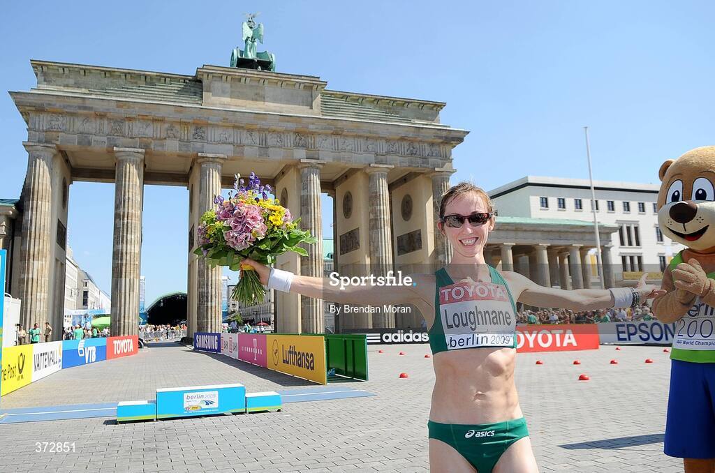 16 August 2009; Ireland's Olive Loughnane celebrates at the Brandenburg Gate after finishing second and winning a silver medal in the Women's 20K Walk Final. 12th IAAF World Championships in Athletics, Berlin, Germany. Picture credit: Brendan Moran  / SPORTSFILE