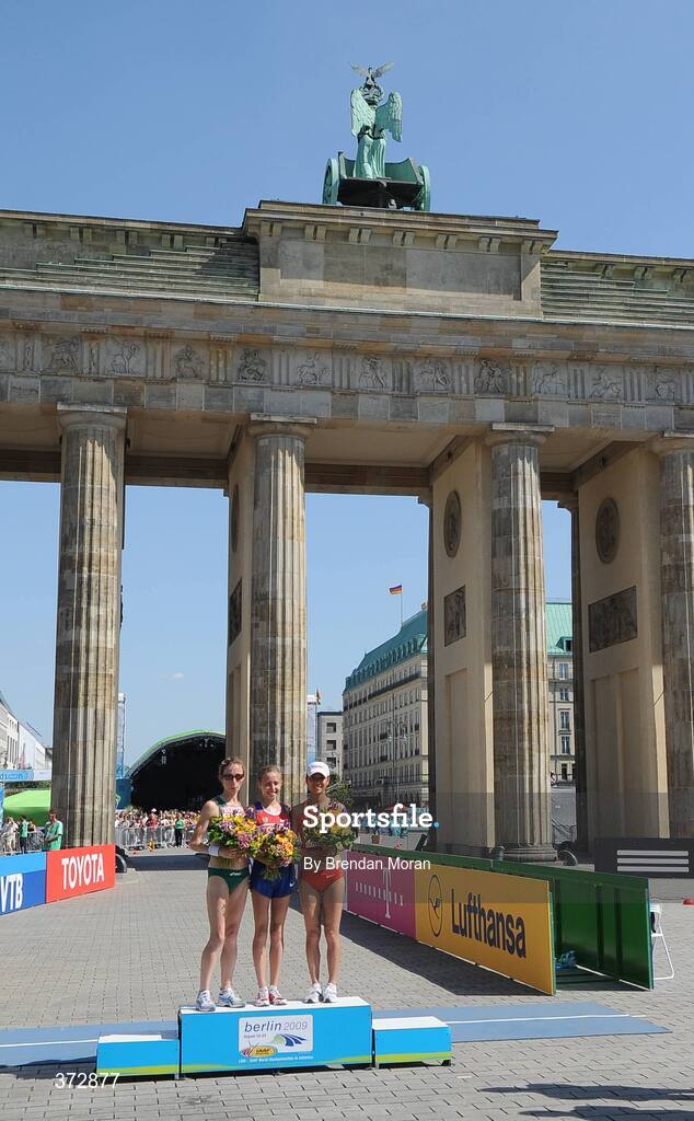 16 August 2009; Ireland's Olive Loughnane on the podium with winner Olga Kaniskina,centre,  of Russia, and third placed Hong Liu, right, of China, after the Women's 20K Walk Final.12th IAAF World Championships in Athletics, Berlin, Germany. Picture credit: Brendan Moran  / SPORTSFILE