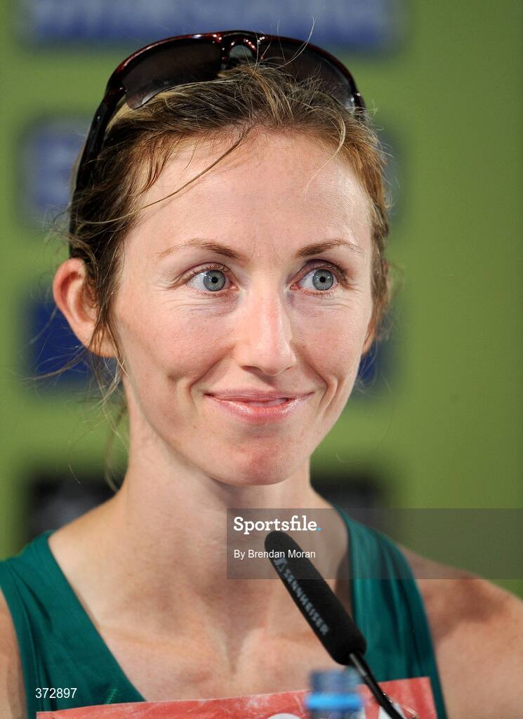 16 August 2009; A smiling Olive Loughnane of Ireland after finishing second in a season best time of 1:28.58 and winning a silver medal in the Women's 20K Walk Final.12th IAAF World Championships in Athletics, Berlin, Germany. Picture credit: Brendan Moran  / SPORTSFILE