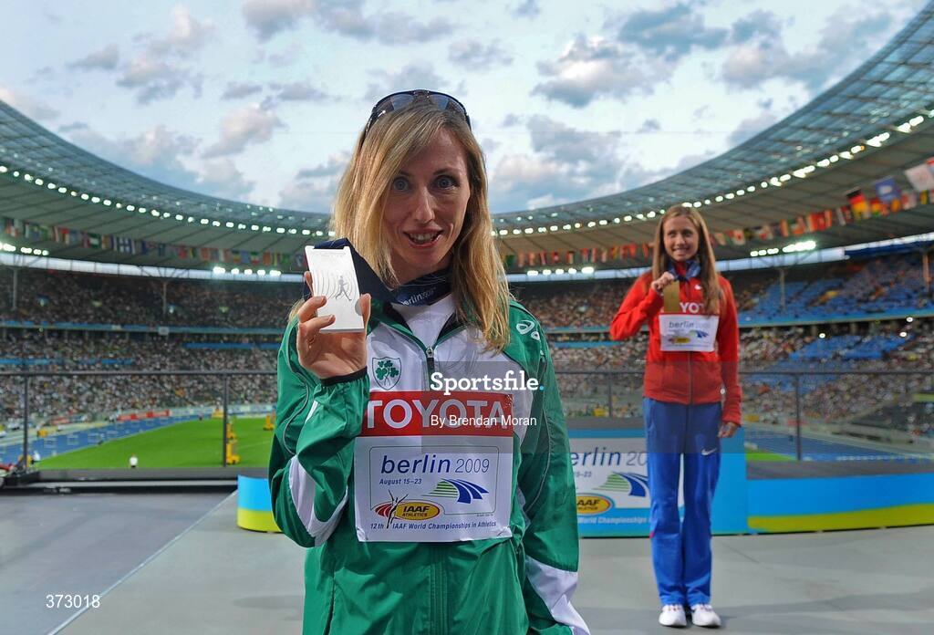 16 August 2009; Ireland's Olive Loughnane in the Olympic Stadium, alongside winner Olga Kaniskina of Russia, with the Silver Medal she won in the Women's 20K Walk Final. 12th IAAF World Championships in Athletics, Berlin, Germany. Picture credit: Brendan Moran  / SPORTSFILE
