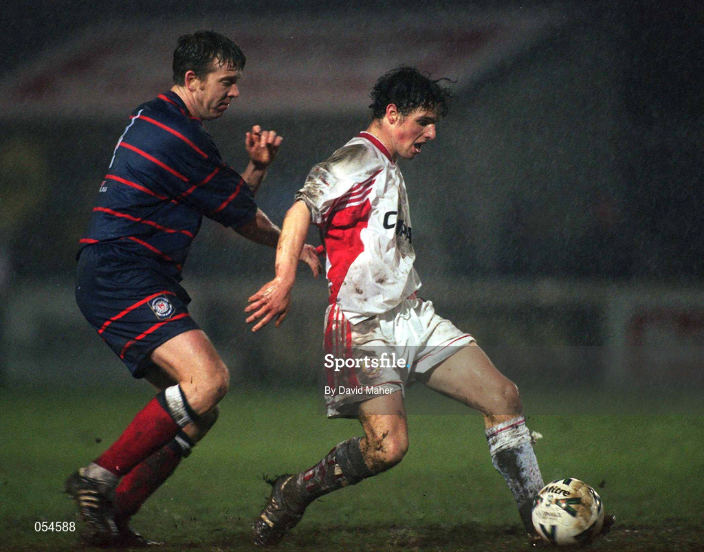 11 January 2000; Aubrey Dolan of Galway United in action against Donal Broughan of St. Patrick's Athletic during the Harp Larger FAI Cup Second Round Replay match between St Patrick's Athletic and Galway United at Richmond Park in Dublin. Photo by David Maher/Sportsfile