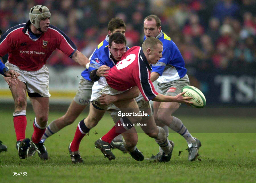 20 January 2001; Peter Stringer of Munster is tackled by theirry Labrousse of Castres during the Heineken Cup Pool 4 Round 6 match between Munster and Castres at Musgrave Park in Cork. Photo by Brendan Moran/Sportsfile