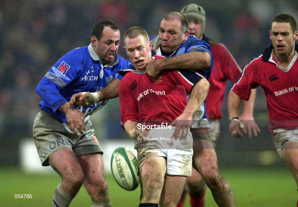 20 January 2001; Peter Stringer of Munster is tackled by Jose Diaz, left, and Philippe Garrigues of Castres during the Heineken Cup Pool 4 Round 6 match between Munster and Castres at Musgrave Park in Cork. Photo by Brendan Moran/Sportsfile