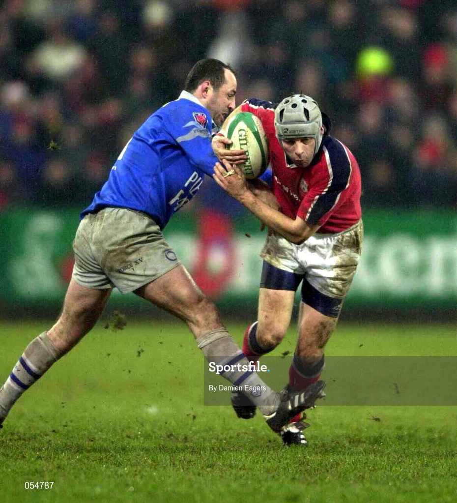 20 January 2001; Killian Keane of Munster is tackled by Philippe Garrigues of Castres during the Heineken Cup Pool 4 Round 6 match between Munster and Castres at Musgrave Park in Cork. Photo by Damien Eagers/Sportsfile