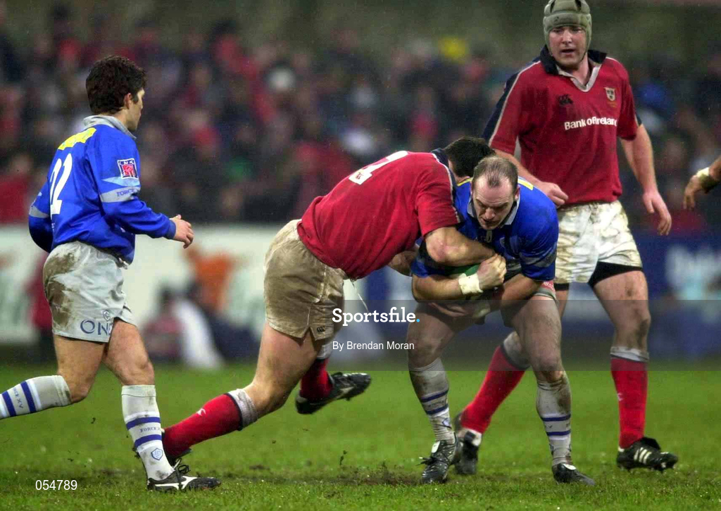 20 January 2001; Gregor Townsend of Castres is tackled by David Wallace of Munster during the Heineken Cup Pool 4 Round 6 match between Munster and Castres at Musgrave Park in Cork. Photo by Brendan Moran/Sportsfile