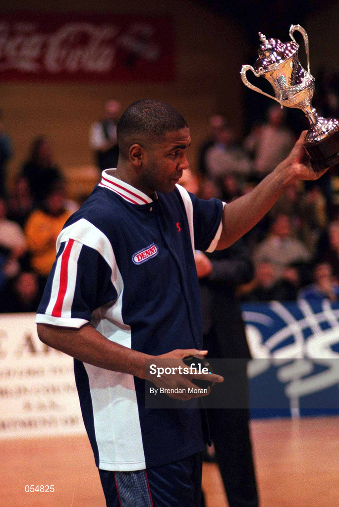 30 January 2000; Anthony Jenkins, Denny Notre Dame captain/coach, lifts the Sprite Cup following the Senior Men's Sprite Cup Final between Denny Notre Dame and St Vincent's at the National Basketball Arena in Tallaght, Dublin. Photo by Brendan Moran/Sportsfile