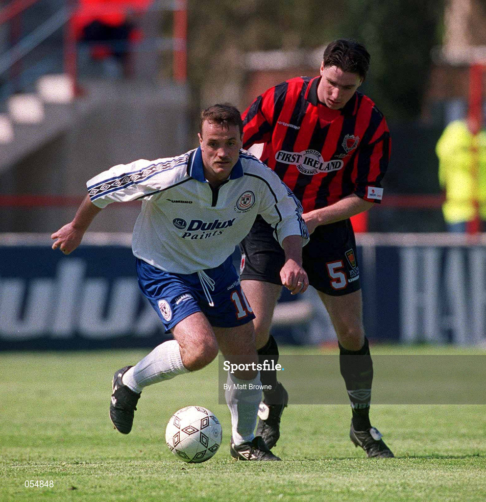 30 April 2000; Stephen Geoghegan of Shelbourne  in action against Shaun Maher of  Bohemians during the FAI Cup Final match between Shelbourne and Bohemians at Tolka Park in Dublin. Photo by Matt Browne/Sportsfile