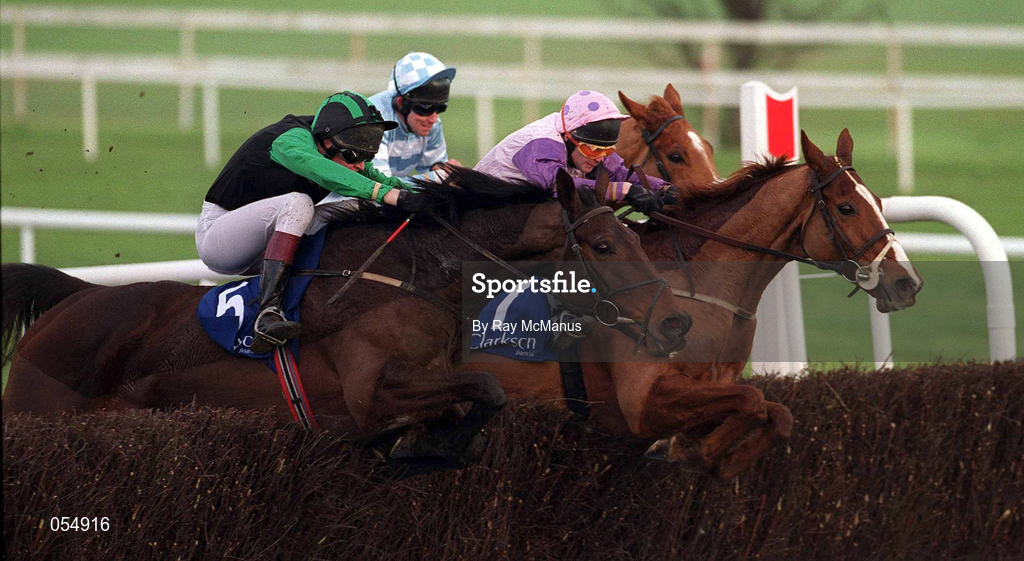 21 January 2001; Feeling Grand, 5, with Barry Geraghty up, jumps the last ahead of Be Home Early, with D.J. Casey up, and More Than A Stroll, with Conor O'Dwyer up, on their way to win The Clarkson Financial Handicap Steeplechase at Leopardstown Racecourse in Dublin. Photo by Ray McManus/Sportsfile