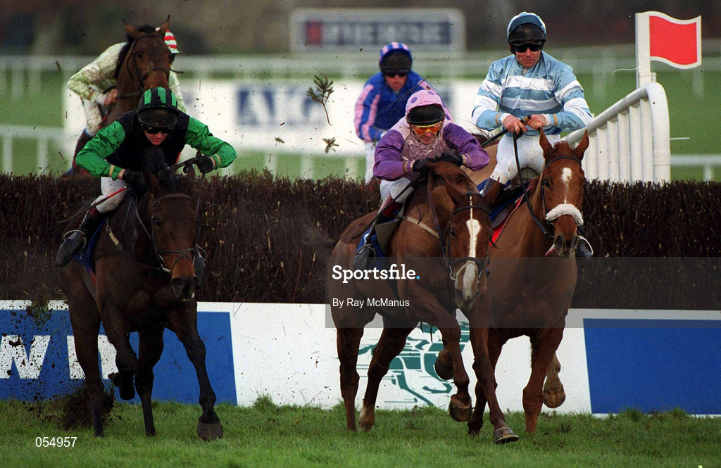 21 January 2001; Eventual winner Feeling Grand, left,  with Barry Geraghty up, races along side Be Home Early, with David Casey up, centre, and More Than a Stroll, with Conor O'Dwyer up, on their way to win The Clarkson Financial Handicap Steplechase at Leopardstown Racecourse in Dublin. Photo by Ray McManus/Sportsfile