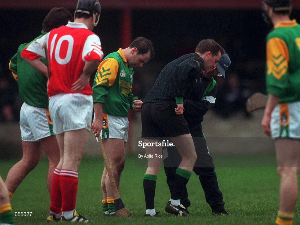 30 January 2000; Referee Eamonn Morris receives medical attention during the Kehoe Cup Quarter-Final match between Meath and Louth at Pairc Naomh Brid in Dundalk, Louth. Photo by Aoife Rice/Sportsfile