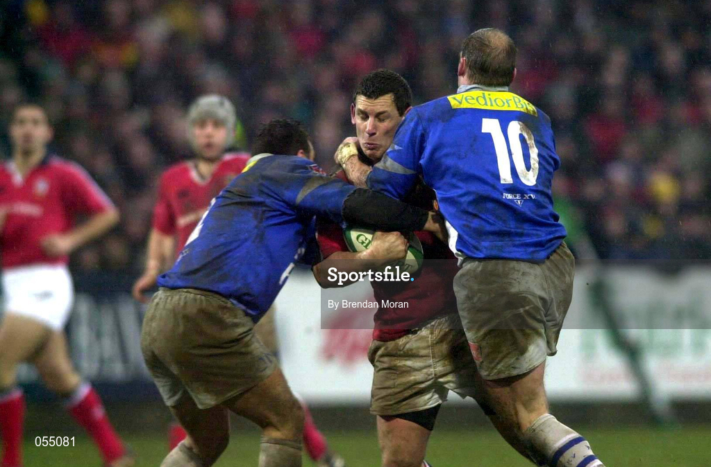 20 January 2001; Jason Holland of Munster is tackled by Damien Denechanny, left, and Gregor Townsend of Castres during the Heineken Cup Pool 4 Round 6 match between Munster and Castres at Musgrave Park in Cork. Photo by Brendan Moran/Sportsfile