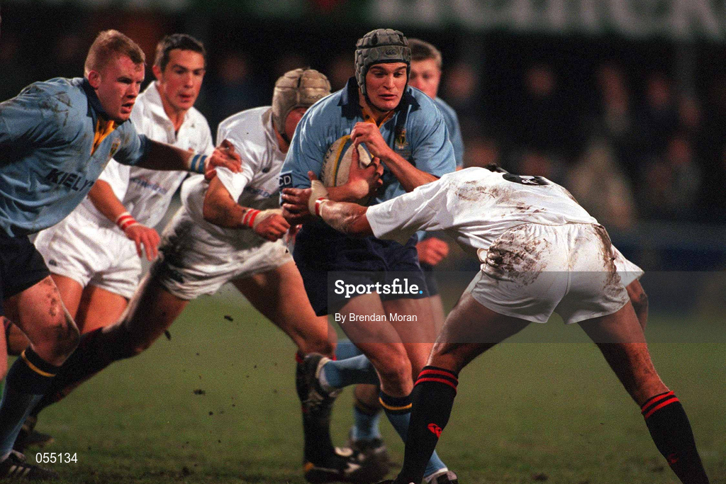 24 January 2001; Michael Colling of UCD in action against Dominic St George of Trinity during the Annual Rugby Colours Match between UCD and Trinity at Donnybrook Stadium in Dublin. Photo by Brendan Moran/Sportsfile