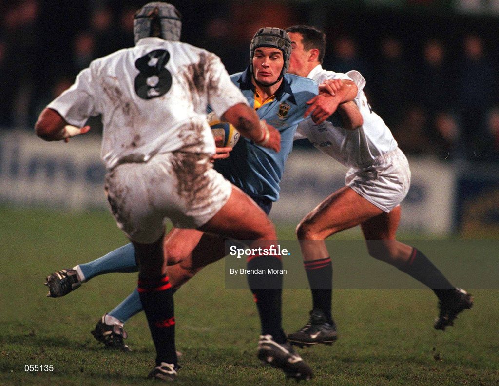 24 January 2001; Michael Colling of UCD in action against Dominic St George of Trinity during the Annual Rugby Colours Match between UCD and Trinity at Donnybrook Stadium in Dublin. Photo by Brendan Moran/Sportsfile