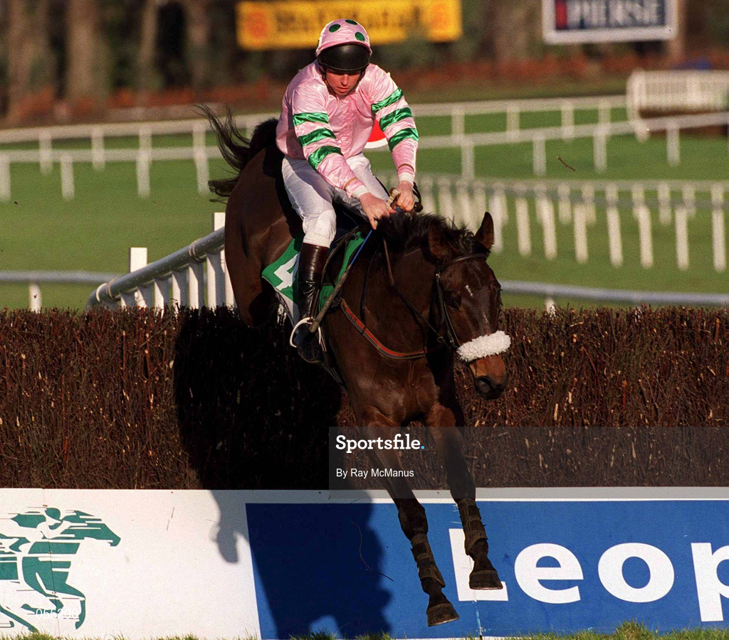21 January 2001; Brown Buck, with Barry Cash up, jumps the fence first time round during The Bailey's Arkle Perpetual Challenge Cup Novice Steeplechase at Leopardstown Racecourse in Dublin. Photo by Ray McManus/Sportsfile