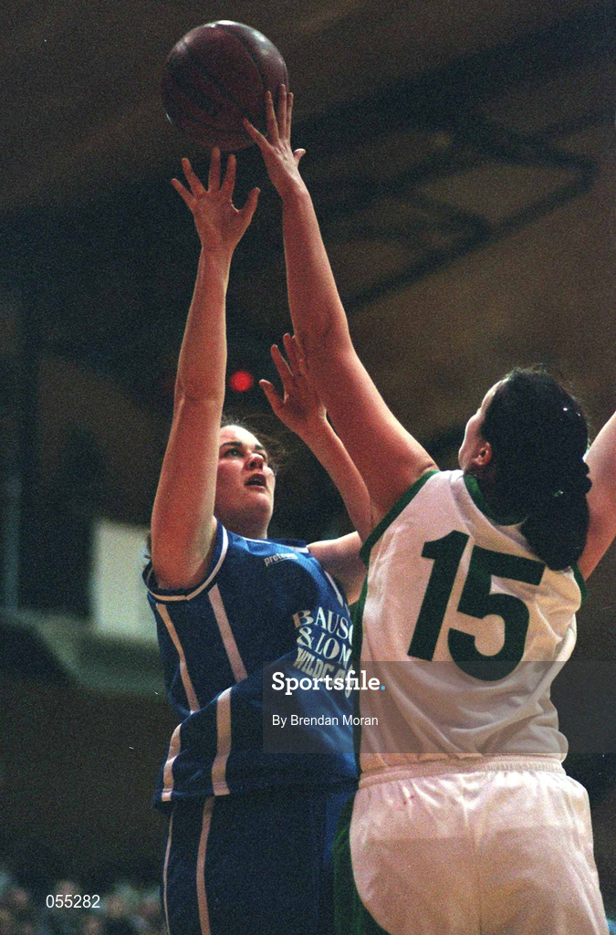 26 January 2001; Trish Nolan of Wildcats goes up for a basket despite the challenge of Sinead Leahy of UL Limerick during the ESB Women's Cup Semi-Final match between Wildcats and UL Limerick at the National Basketball Arena in Tallaght, Dublin. Photo by Brendan Moran/Sportsfile