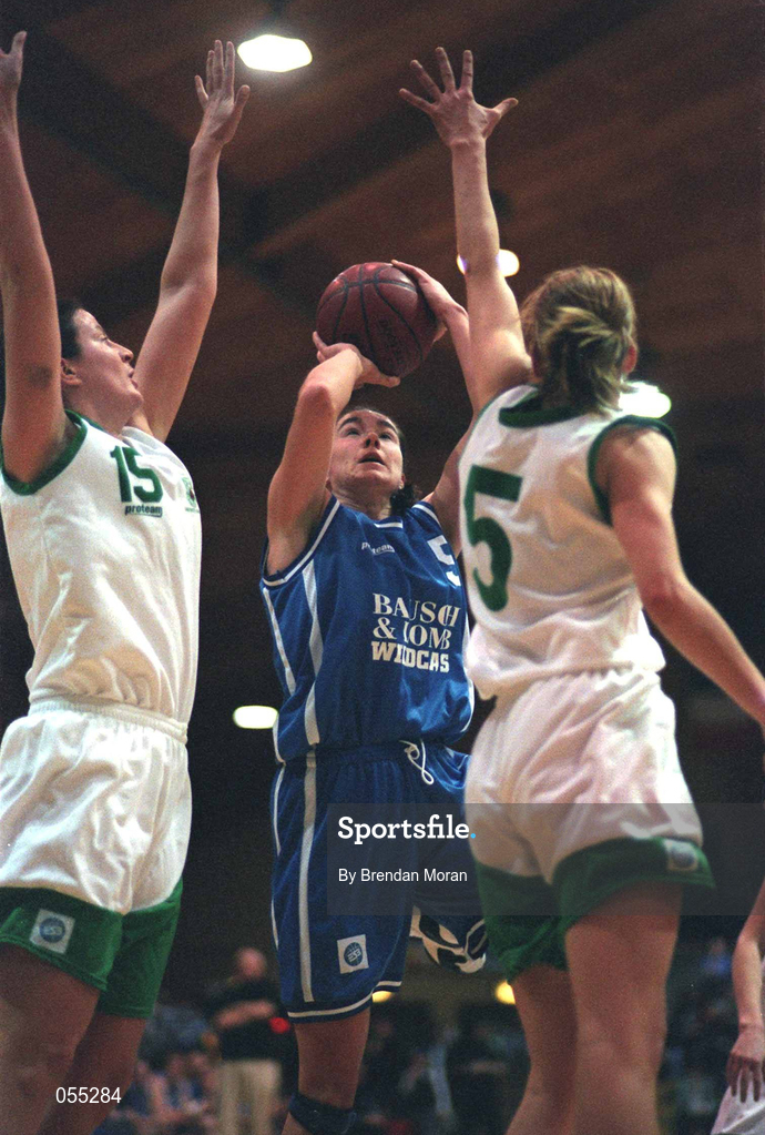 26 January 2001; Jillian Hayes of Wildcats goes up for a basket despite the challenge of Sinead Leahy, left, and Juliet Murphy of UL Limerick during the ESB Women's Cup Semi-Final match between Wildcats and UL Limerick at the National Basketball Arena in Tallaght, Dublin. Photo by Brendan Moran/Sportsfile