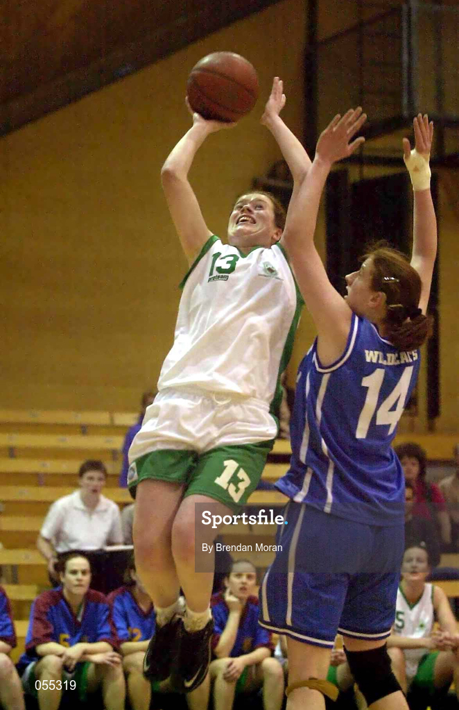 26 January 2001; Maura Guiney of UL Limerick goes up for a basket despite the challenge of Orla Dempsey of Wildcats during the ESB Women's Cup Semi-Final match between Wildcats and UL Limerick at the National Basketball Arena in Tallaght, Dublin. Photo by Brendan Moran/Sportsfile