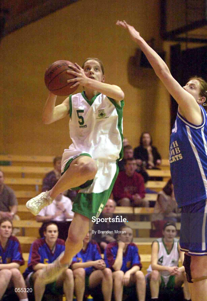 26 January 2001;  Juliet Murphy of UL Limerick goes up for a basket despite the challenge of Orla Dempsey of Wildcats during the ESB Women's Cup Semi-Final match between Wildcats and UL Limerick at the National Basketball Arena in Tallaght, Dublin. Photo by Brendan Moran/Sportsfile