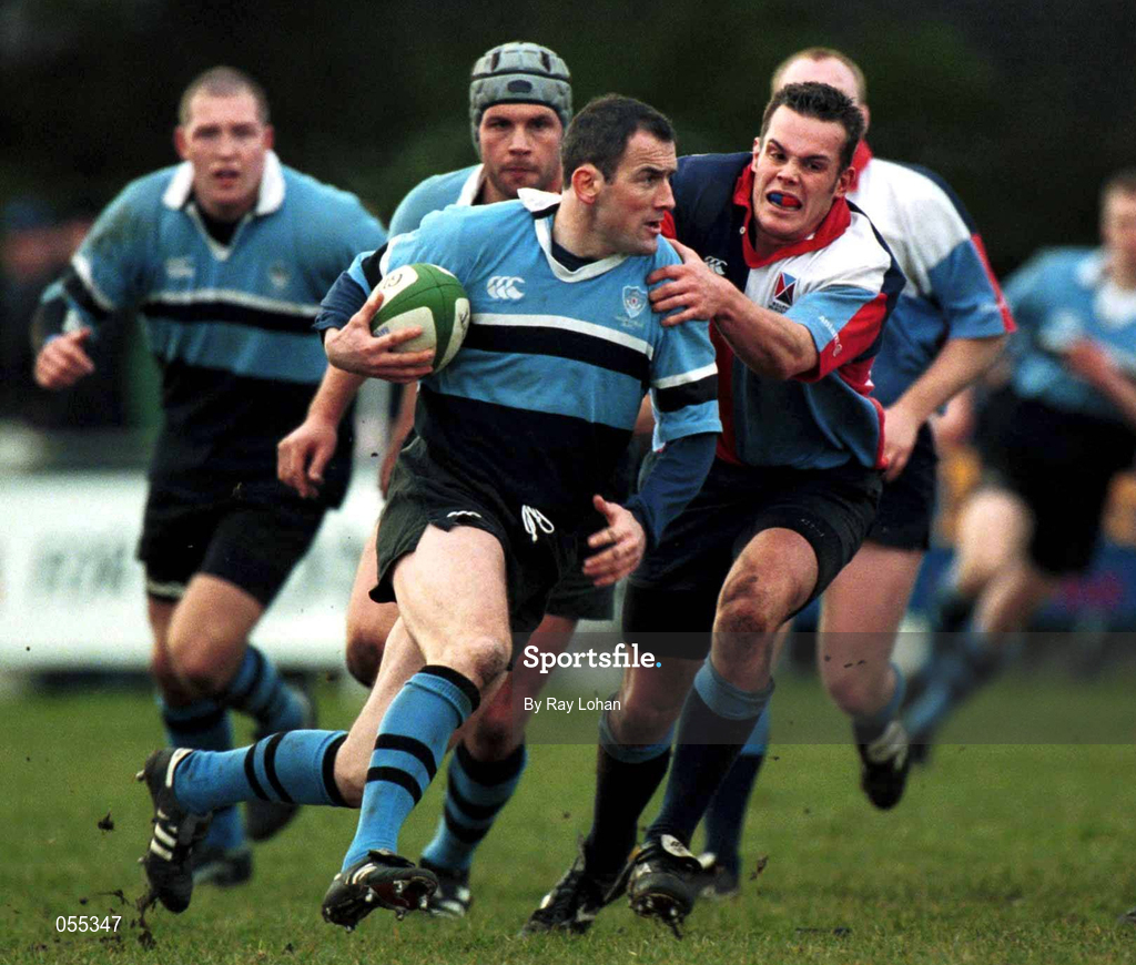 27 January 2001; Eric Elwood of Galwegians is tackled by Chris McCarey of Belfast Harlequins during the AIB All-Ireland League Division 1 match between Galwegians and Belfast Harlequins at Crowley Park in Galway. Photo by Ray Lohan/Sportsfile