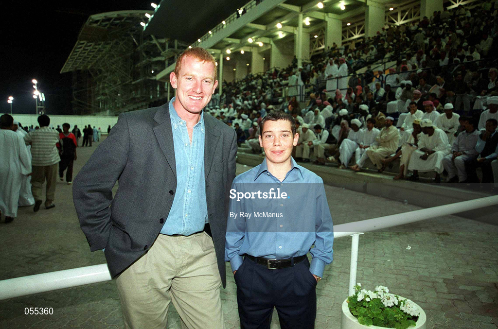 26 January 2001; Pictured at the races in Dubai are Kerry footballer and All-Star Liam Hassett with jockey Timmy Houlihan, from Kilorglin during an exhibition match on the Eircell GAA All-Star tour at the Dubai Rugby Ground in Dubai, United Arab Emirates. Photo by Ray McManus/Sportsfile