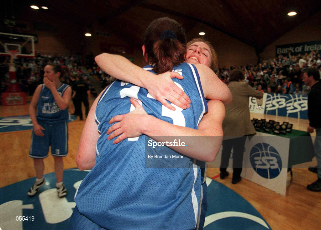 28 January 2001; Wildcats players Trish Nolan, left, and Olivia O'Reilly embrace after victory in the ESB Women's Cup Final match between Wildcats and Tolka Rovers at the National Basketball Arena in Tallaght, Dublin. Photo by Brendan Moran/Sportsfile