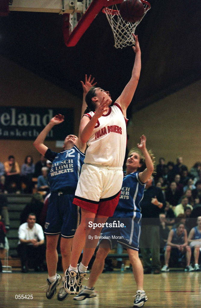 28 January 2001; Lorraine O'Brien of Tolka Rovers shoots for a basket despite the best efforts of Chrsitine Kiely of Wildcats during the ESB Women's Cup Final match between Wildcats and Tolka Rovers at the National Basketball Arena in Tallaght, Dublin. Photo by Brendan Moran/Sportsfile
