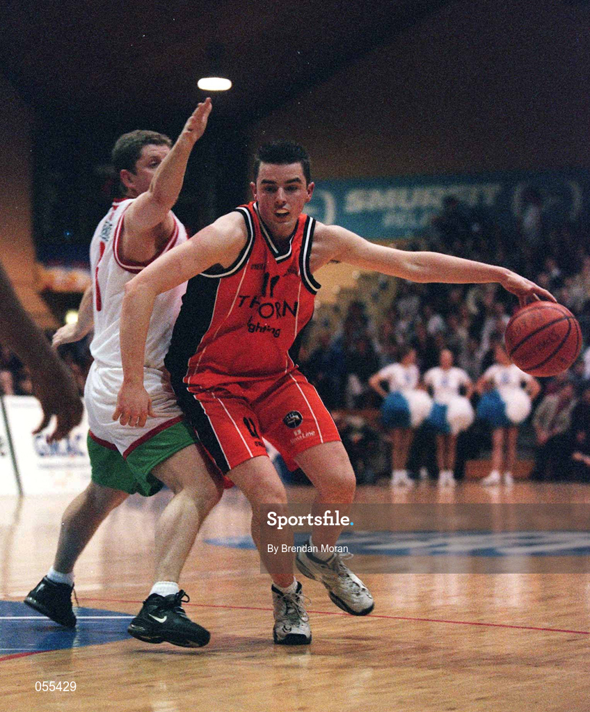 28 January 2001; Paddy Kelly of Killester gets around Paul McStay of Longnecks Ballina during the ESB Men's Cup Final match between Killester and Longnecks Ballina at the National Basketball Arena in Tallaght, Dublin. Photo by Brendan Moran/Sportsfile