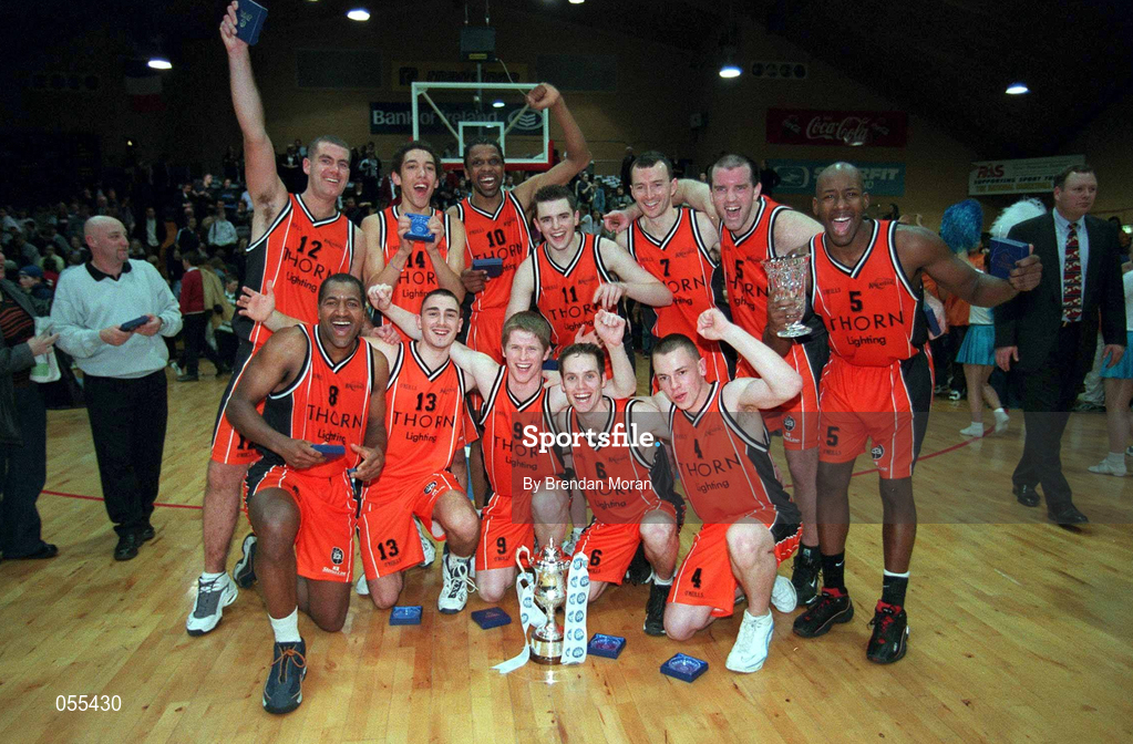 28 January 2001; The Killester team celebrate their win following the ESB Men's Cup Final match between Killester and Longnecks Ballina at the National Basketball Arena in Tallaght, Dublin. Photo by Brendan Moran/Sportsfile