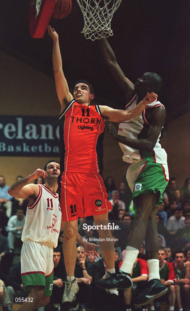 28 January 2001; Paddy Kelly of Killester goes up for a score despite the attemped check by Deora Marsh of Lonecks Ballina during the ESB Men's Cup Final match between Killester and Longnecks Ballina at the National Basketball Arena in Tallaght, Dublin. Photo by Brendan Moran/Sportsfile